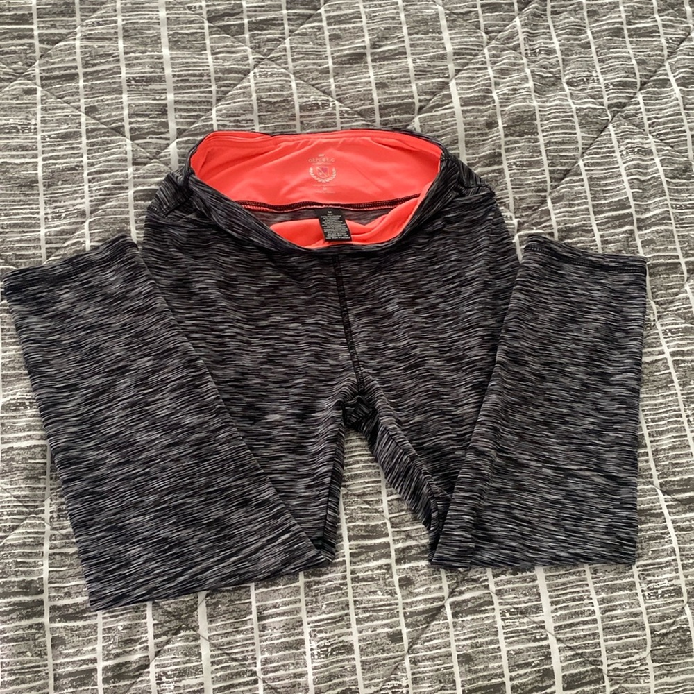 Gray woman’s capris pants. Running walking hiking